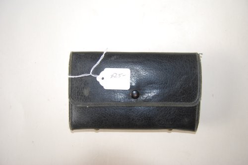 7 in. COMMON SENSE FLY WALLET. 7 in. x 4.5 in. Black Leatherette Cover with snap; 2 dual spring clips for snelled flies; 4 felt sheets; Wth about 50 snelled flies.